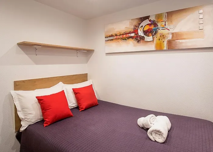 De L'horloge Aparthotel