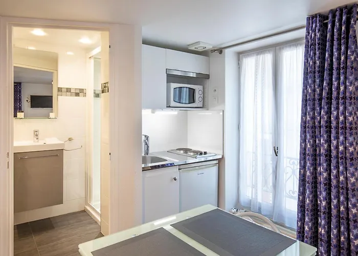 De L'horloge Aparthotel