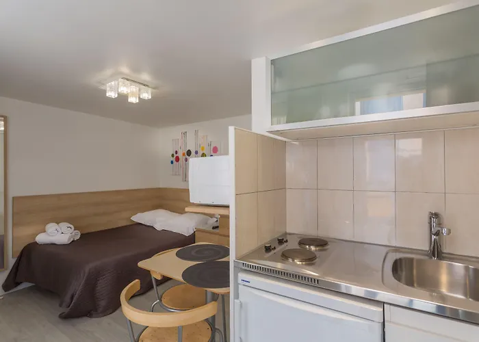 De L'horloge Aparthotel