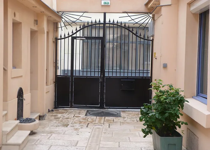 De L'horloge Aparthotel