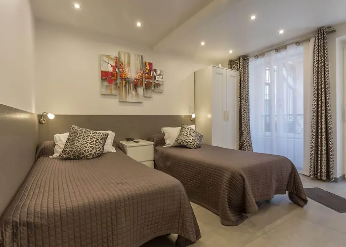 De L'horloge Aparthotel